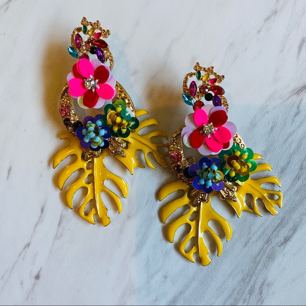 Mixed metal and sequin earrings.